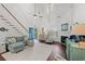 Bright and spacious living room featuring high ceilings, fireplace, and access to outdoor views at 1725 26Th Ave N, North Myrtle Beach, SC 29582