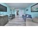 Inviting living room with cozy seating, a flat-screen TV, and stylish decor in a beachy aesthetic at 2000 N Ocean Blvd. # 1209, Myrtle Beach, SC 29577