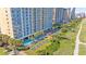 Beautiful high-rise resort featuring a pool and sunbathing area, perfect for relaxation and enjoying the coastal views at 2000 N Ocean Blvd. # 1209, Myrtle Beach, SC 29577