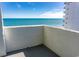 Enjoy ocean views from this private balcony with a white stucco half wall at 2001 S Ocean Blvd. S # 1302, Myrtle Beach, SC 29577