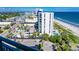 Beautiful exterior view of a white condo building with ocean views and parking at 2001 S Ocean Blvd. S # 1302, Myrtle Beach, SC 29577