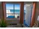 Breathtaking ocean views from dining area with balcony access and cozy ambiance at 2001 S Ocean Blvd. S # 1302, Myrtle Beach, SC 29577