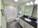Bathroom with a shower-tub combo, granite vanity, and nautical accents, creating a pleasant, usable space at 2007 S Ocean Blvd. # 604, Myrtle Beach, SC 29577