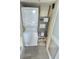 Compact laundry closet with stackable washer and dryer for convenient in-unit laundry at 2007 S Ocean Blvd. # 604, Myrtle Beach, SC 29577