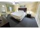 A restful bedroom features a king-sized bed, soft lighting, and stylish furnishings for relaxation at 2007 S Ocean Blvd. # 604, Myrtle Beach, SC 29577