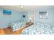 Cozy bedroom featuring twin beds, nautical themed decor, and a light blue color scheme at 202 27Th Ave. N, North Myrtle Beach, SC 29582