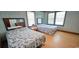 Bedroom featuring two beds with matching blue floral patterns and wooden furniture at 202 27Th Ave. N, North Myrtle Beach, SC 29582