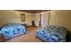 Bedroom featuring two beds with colorful floral patterns and classic wooden furniture at 202 27Th Ave. N, North Myrtle Beach, SC 29582
