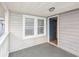Exterior deck leading to an interior doorway at 202 27Th Ave. N, North Myrtle Beach, SC 29582