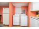 Convenient laundry area off kitchen with modern washer and dryer at 202 27Th Ave. N, North Myrtle Beach, SC 29582
