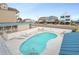 Elevated view of a community pool area, highlighting the convenience and enjoyment for residents at 202 27Th Ave. N, North Myrtle Beach, SC 29582