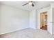 Bedroom featuring carpet floors, a ceiling fan and an interior door at 211 Seasons Trace Loop, Longs, SC 29568