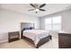 Bedroom features ceiling fan, carpet flooring, and a window for natural light at 211 Seasons Trace Loop, Longs, SC 29568