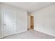 Bedroom with carpet floors, white walls, and interior door at 211 Seasons Trace Loop, Longs, SC 29568