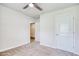 Bedroom with ceiling fan, carpet floors and interior door at 211 Seasons Trace Loop, Longs, SC 29568