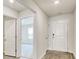 Bright entryway with gray wood-look flooring at 211 Seasons Trace Loop, Longs, SC 29568