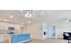 Bright kitchen offers an island, stainless steel appliances, and a convenient pass-through to the cozy living area at 211 Seasons Trace Loop, Longs, SC 29568