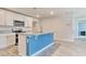 Modern kitchen features stainless steel appliances, an island with seating and granite countertops at 211 Seasons Trace Loop, Longs, SC 29568