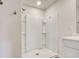 Bathroom features white tiled walk-in shower at 211 Seasons Trace Loop, Longs, SC 29568