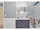 Clean bathroom with gray vanity, white countertops, and ample cabinet storage at 2196 Liberty Circle, Little River, SC 29566