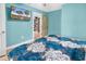 Airy bedroom with blue walls, white trim, and easy access to adjacent rooms at 2196 Liberty Circle, Little River, SC 29566