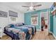 Comfortable bedroom with blue walls, a walk-in closet, and ample space at 2196 Liberty Circle, Little River, SC 29566