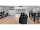 Open living space with stylish seating, dining area, and seamless flow to outdoor spaces at 2196 Liberty Circle, Little River, SC 29566