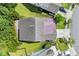 Aerial view of a well-maintained home with lush green lawn, mature trees, and a paved driveway at 2199 Birchwood Circle, Myrtle Beach, SC 29577