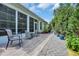 Outdoor patio area with stylish seating and lush landscaping at 2199 Birchwood Circle, Myrtle Beach, SC 29577