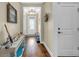 Welcoming foyer with hardwood floors and decorative console table at 2199 Birchwood Circle, Myrtle Beach, SC 29577