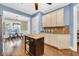 Well-equipped kitchen featuring an island and stainless steel appliances, seamlessly connected to the dining area at 2199 Birchwood Circle, Myrtle Beach, SC 29577