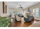 Spacious living room with hardwood floors, plantation shutters, and comfortable seating at 2199 Birchwood Circle, Myrtle Beach, SC 29577
