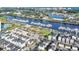 Aerial view of the town, golf course, and waterfront property at 2336 Tidewatch Way, North Myrtle Beach, SC 29582