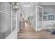 Bright foyer with hardwood floors, stylish decor, and an open view to the living area at 2336 Tidewatch Way, North Myrtle Beach, SC 29582