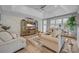 Inviting living room with comfortable seating, stylish decor, and a large entertainment center at 2336 Tidewatch Way, North Myrtle Beach, SC 29582