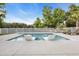 Beautiful backyard pool with in-pool seating and an outdoor kitchen area at 2336 Tidewatch Way, North Myrtle Beach, SC 29582