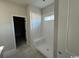Modern bathroom features a tiled walk-in shower with a built-in bench, ready for personalization and relaxation at 3012 Palma Way, Myrtle Beach, SC 29579