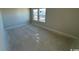 A spacious bedroom has two windows providing ample natural light at 3012 Palma Way, Myrtle Beach, SC 29579