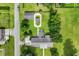 Aerial view of the property highlighting the home's layout, landscaping, and outdoor living spaces at 312 S Poplar Ave., Andrews, SC 29510