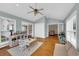 Spacious playroom with hardwood floors, plenty of natural light, and neutral paint at 312 S Poplar Ave., Andrews, SC 29510
