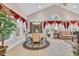 Bright dining area with large windows, stylish seating, and elegant decor, perfect for entertaining at 327 Trestle Way, Conway, SC 29526