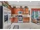 Spacious kitchen featuring stainless steel appliances, ample counter space, and wooden cabinetry at 327 Trestle Way, Conway, SC 29526