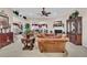 Spacious living room with fireplace, ceiling fan and seamless flow into other living spaces at 327 Trestle Way, Conway, SC 29526