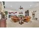 Comfortable living room featuring plush seating, a decorative fireplace, and seamless flow to other living spaces at 327 Trestle Way, Conway, SC 29526