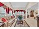 Inviting living room with natural light, neutral tones, stylish decor, and comfortable seating arrangements at 327 Trestle Way, Conway, SC 29526