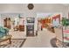 Open concept living space showcasing seamless flow between living room, kitchen, and dining areas at 327 Trestle Way, Conway, SC 29526