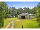 Large barn with sliding doors, ample space, and driveway at 3534 Nichols Hwy., Galivants Ferry, SC 29544
