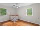 Bedroom with ceiling fan and hardwood floors at 3534 Nichols Hwy., Galivants Ferry, SC 29544