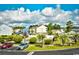 Aerial view of a community pool surrounded by lush landscaping and residential buildings at 3681 Clay Pond Village Ln. # 3103, Myrtle Beach, SC 29579