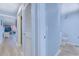 Light and bright hallway featuring wood-look floors and entry to bathroom at 415 Ocean Creek Dr. # 2373, Myrtle Beach, SC 29572